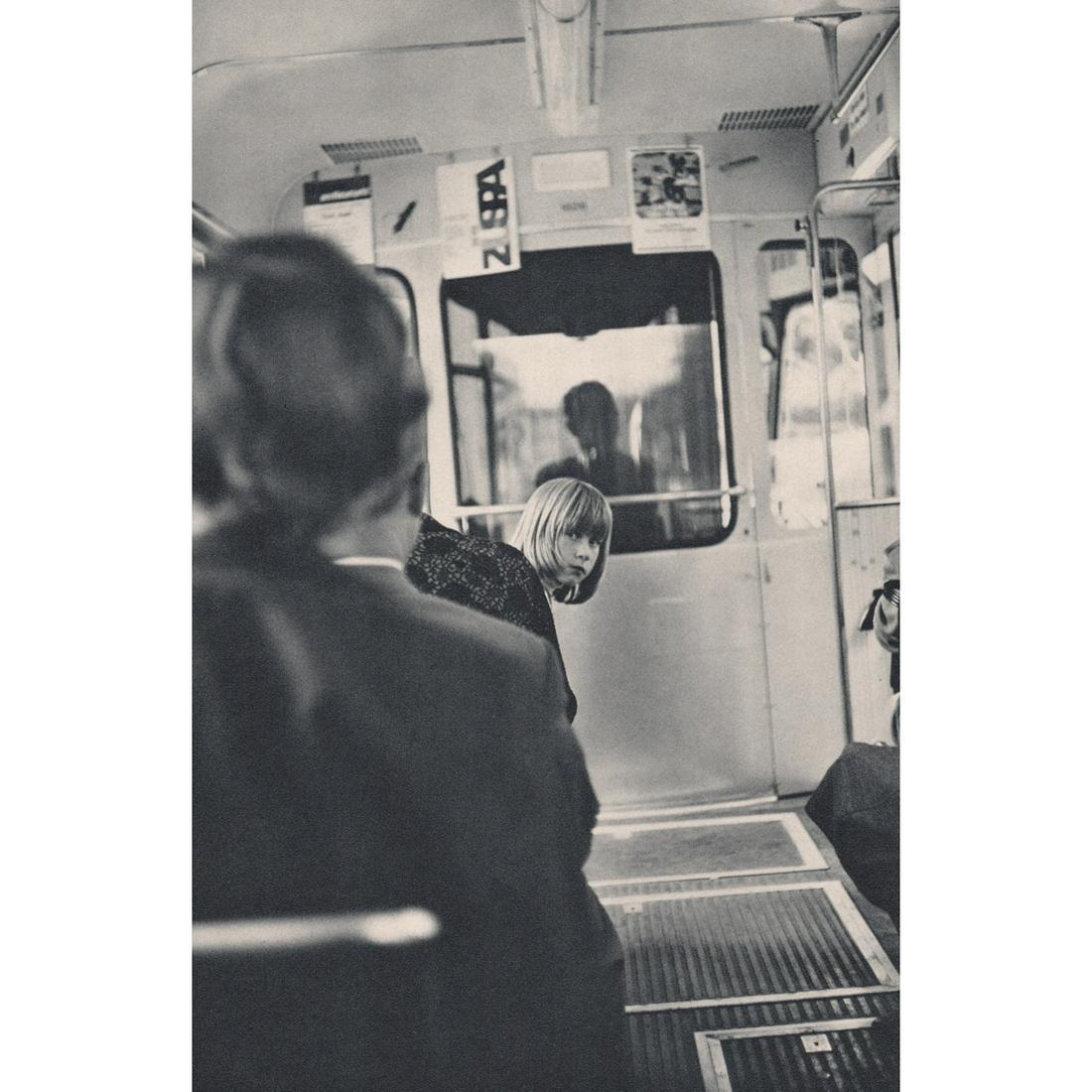 HENRI CARTIER-BRESSON - In the Zurich Tram: Artist: HENRI CARTIER-BRESSON Print Title: In the Zurich Tram Medium: Sheet-fed Gravure Printing Date: 1960's Printed in Switzerland Image Size approx: 9.75 x 6.5 inches Henri Cartier-Bresson (1908-20