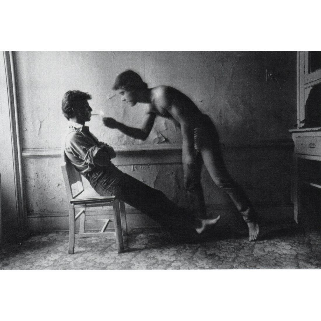 DUANE MICHALS - Just to light his cigarette: Artist: DUANE MICHALS Print Title: Just to light his cigarette was a great pleasure Medium: Sheet-fed Gravure Printing date: 1970s Printed in Great Britain Image Size: 4.25 X 6.5 inches Duane Michals