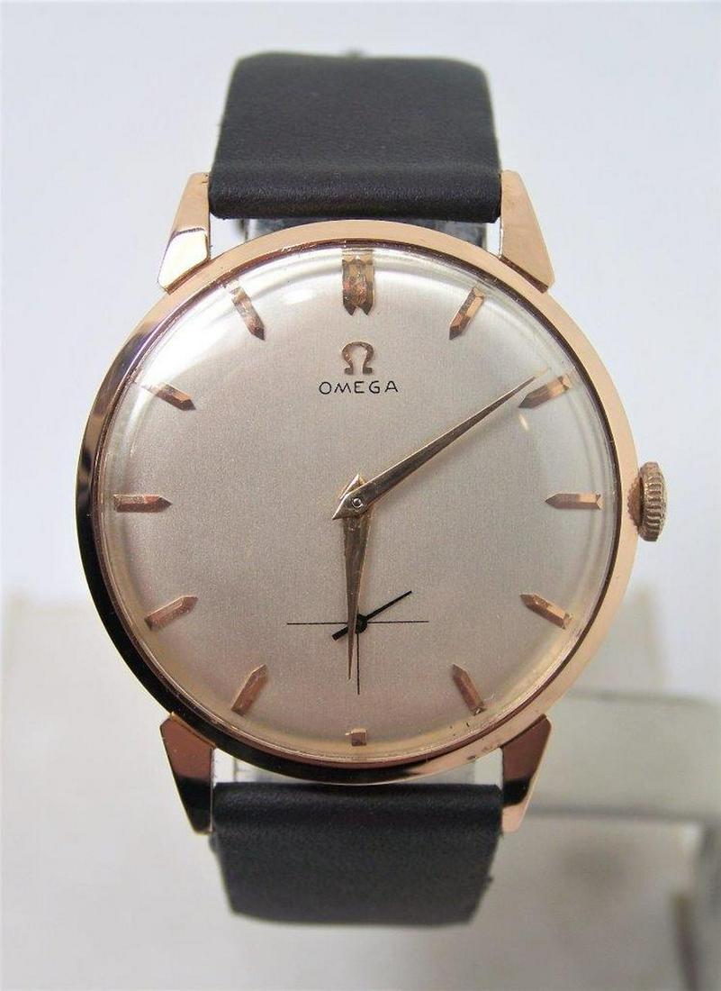 Vintage Solid 18k Rose Gold OMEGA 17J Winding Watch: Description Vintage Solid 18k Rose Gold OMEGA 17J Winding Watch 1950s Cal.265 EXLNT SERVICED? This Mens Omega watch is Swiss made Great present for yourself or someone you love as well as for vintage 