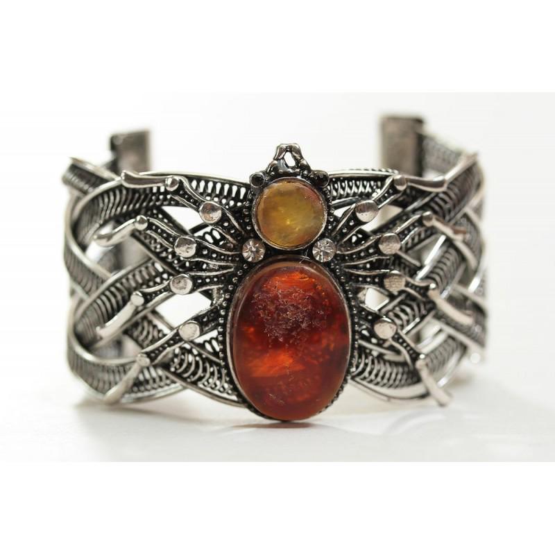55g spider bracelet of natural Baltic amber crystal: Weight: 55 gram (1.94 oz) Bead size: 18x24 mm Length: 660 mm Stone: 100% natural Baltic amber Treatment: no Condition: as on the photo (good) Tested 100% natural Baltic amber: floats in salt water and