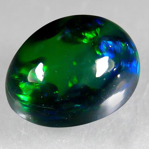 1.40Cts Natural Multi color Black Opal Oval Cabochon: Title: 1.40Cts Natural Multi color Black Opal Oval Cabochon Good Luster loose gemstone Carat Weights: 1.4 Size/Dimensions: 9.10x6.90x4.40 MM Additional Information: ETHIOPIAN - HEATED WITH PLAY OF COL