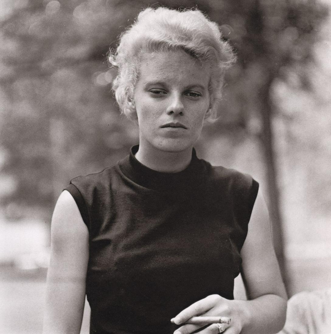 DIANE ARBUS - Girl with a Cigar, Washington Sq Pk, NYC,: Artist: DIANE ARBUS Print Title: Girl with a Cigar, Washington Sq Pk, NYC, 1965 Medium: Photoengraving Printed 1970’s in the US Image size (inches) approx. 8 x 8” Diane Arbus (1923 –1971),was an