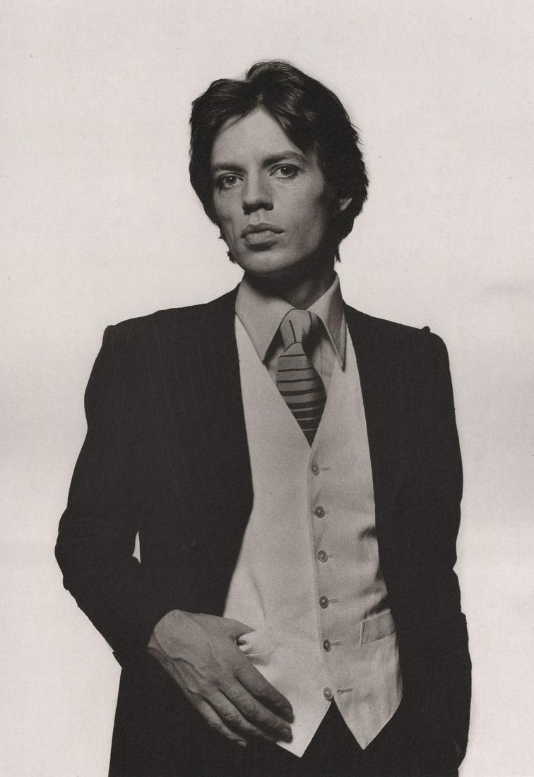 TERRY O’NEILL - Mick Jagger as a business man, 1976: Artist: TERRY O’NEILL Print Title: Mick Jagger as a business man, 1976 Printing Date: 1980’s Medium: photo-lithograph Printed in: Italy Image Size approx.: 9.5 x 6.5” Terry O'Neill ((born 30 Jul
