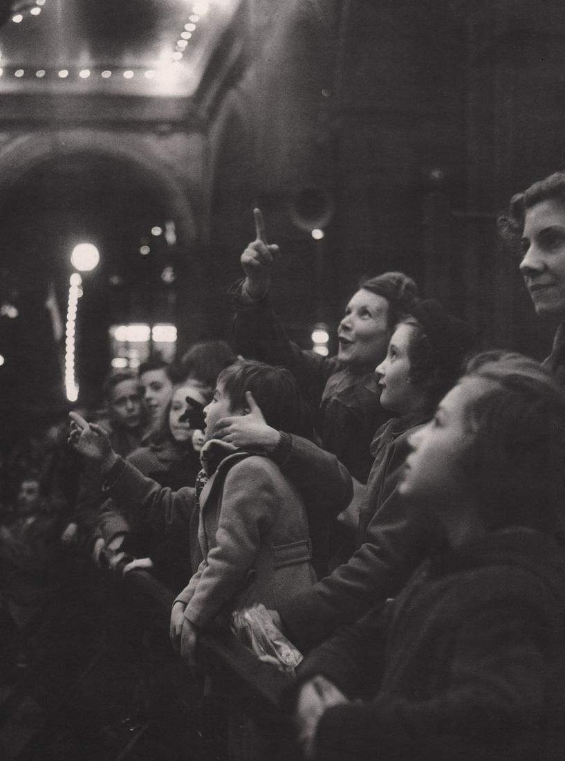 WILLY RONIS - Paris, December, 1952: Artist: WILLY RONIS Print Title: Paris, December, 1952 Printing Date: 1980’s Medium: Photo-lithograph Printed in: France Image Size: approx. 9 x 7” Willy Ronis (French, 1910—2009) was a French