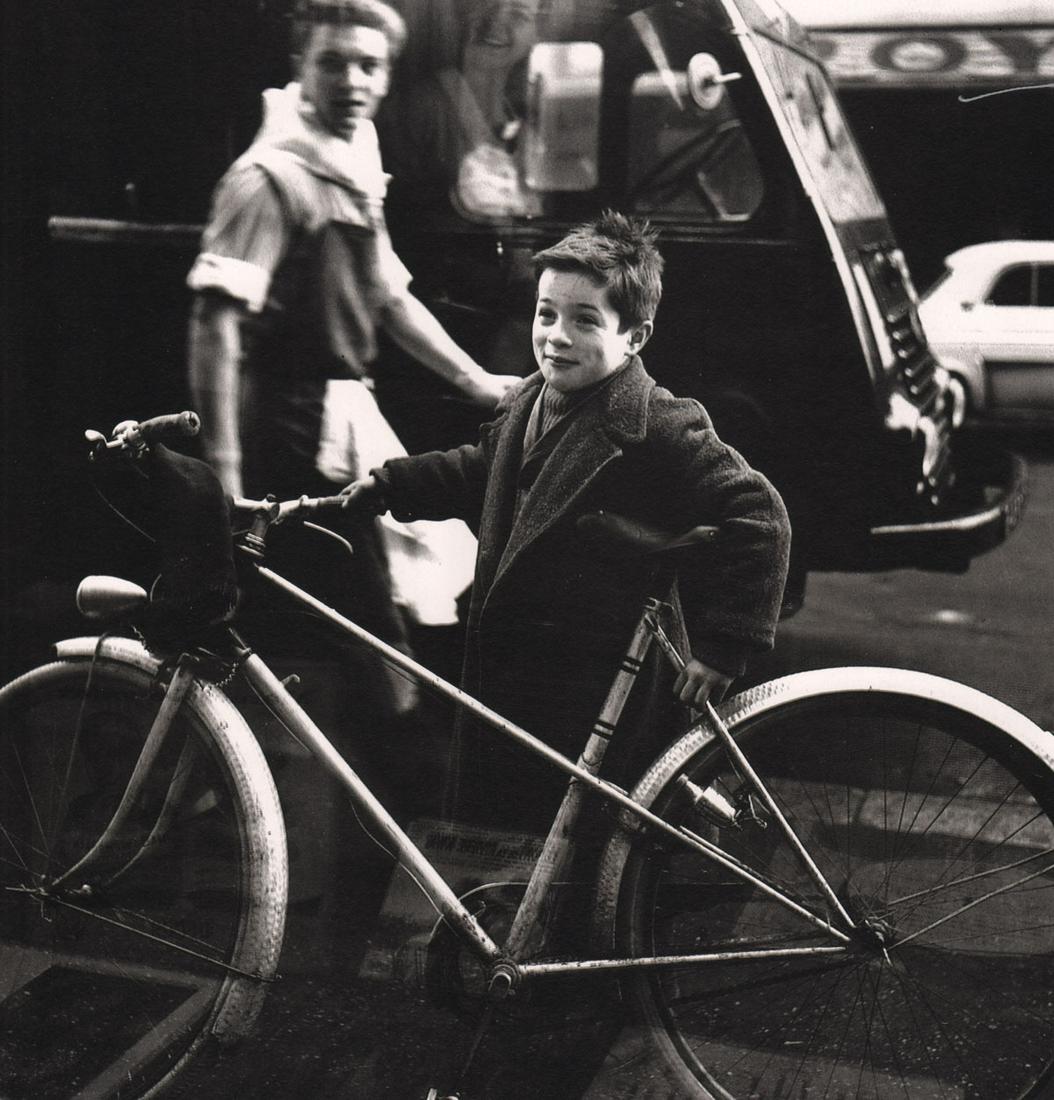 SABINE WEISS - A Boy and his bicycle, Paris 1957: Artist: SABINE WEISS Print Title: A Boy and his bicycle, Paris 1957 Medium: Photoengraving Printed 1950Â’s in the USA Image Size: approx. 8 x 8 Â” Sabine Weiss born Sabine Weber on July 23 , 192