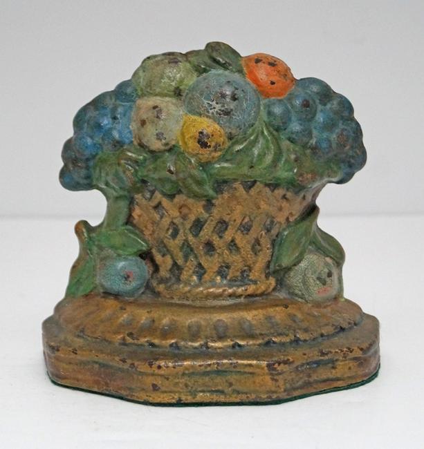 Antique Mixed Fruit in Basket Cast Iron Doorstop: Title: Antique Mixed Fruit in Basket Cast Iron Doorstop Origin: Date: Circa 1920â€™s Dimension: 5 1/8” tall x 5 3/8” wide x 2 ½” deep Provenance/Additional Info: Early su