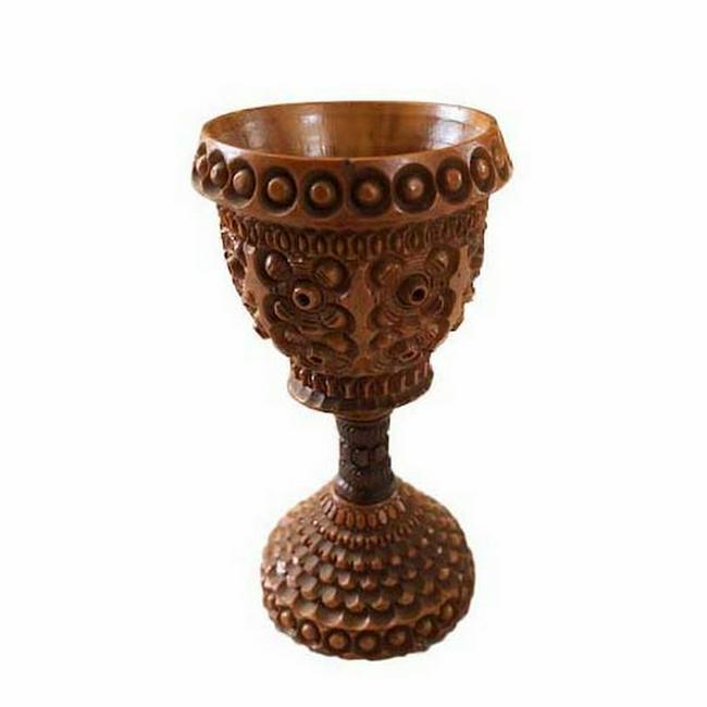 Chip Carved Egg Cup: Title: Chip Carved Egg Cup Date: Dimension: Provenance/Additional Info: 19th C. egg cup, chip-carved from a coquilla nut. The coquilla nut comes from the fruit of Portuguese and Spanish palm trees. It