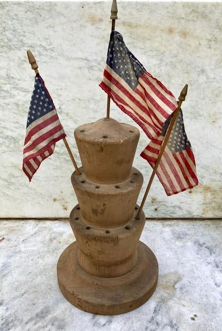 19thc flag holder: Title: 19thc flag holder Origin: Out of Maine Dimensions: 12 1/2” high. 8” bottom diameter Material: Pine never painted Provenance/Additional Info: Original dry wood Shipping: Domestic: Flat-rate 