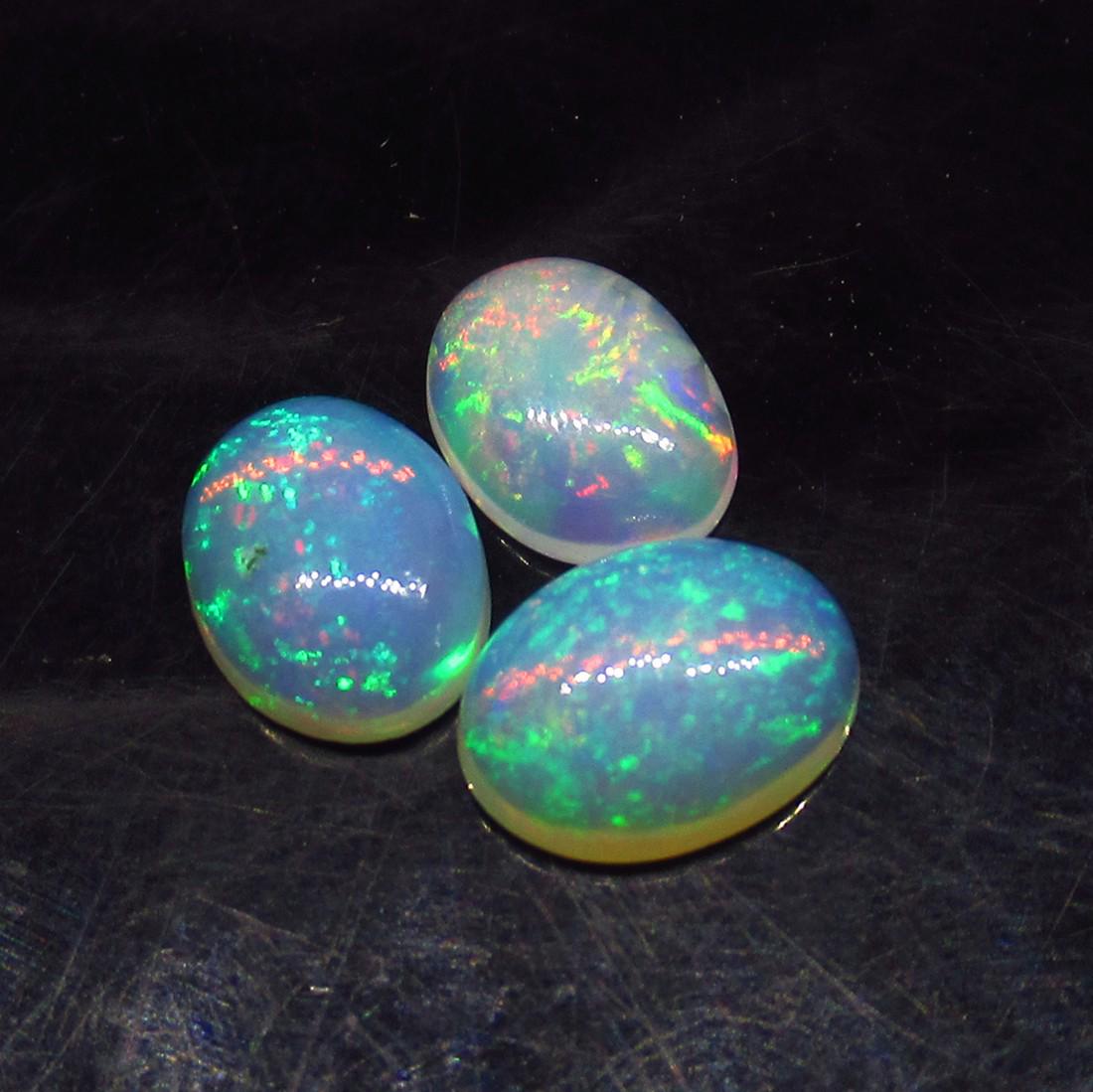 2.08 Ct Natural 3 Ethiopian Multicolor Fire Opal Oval (1 of 2)
