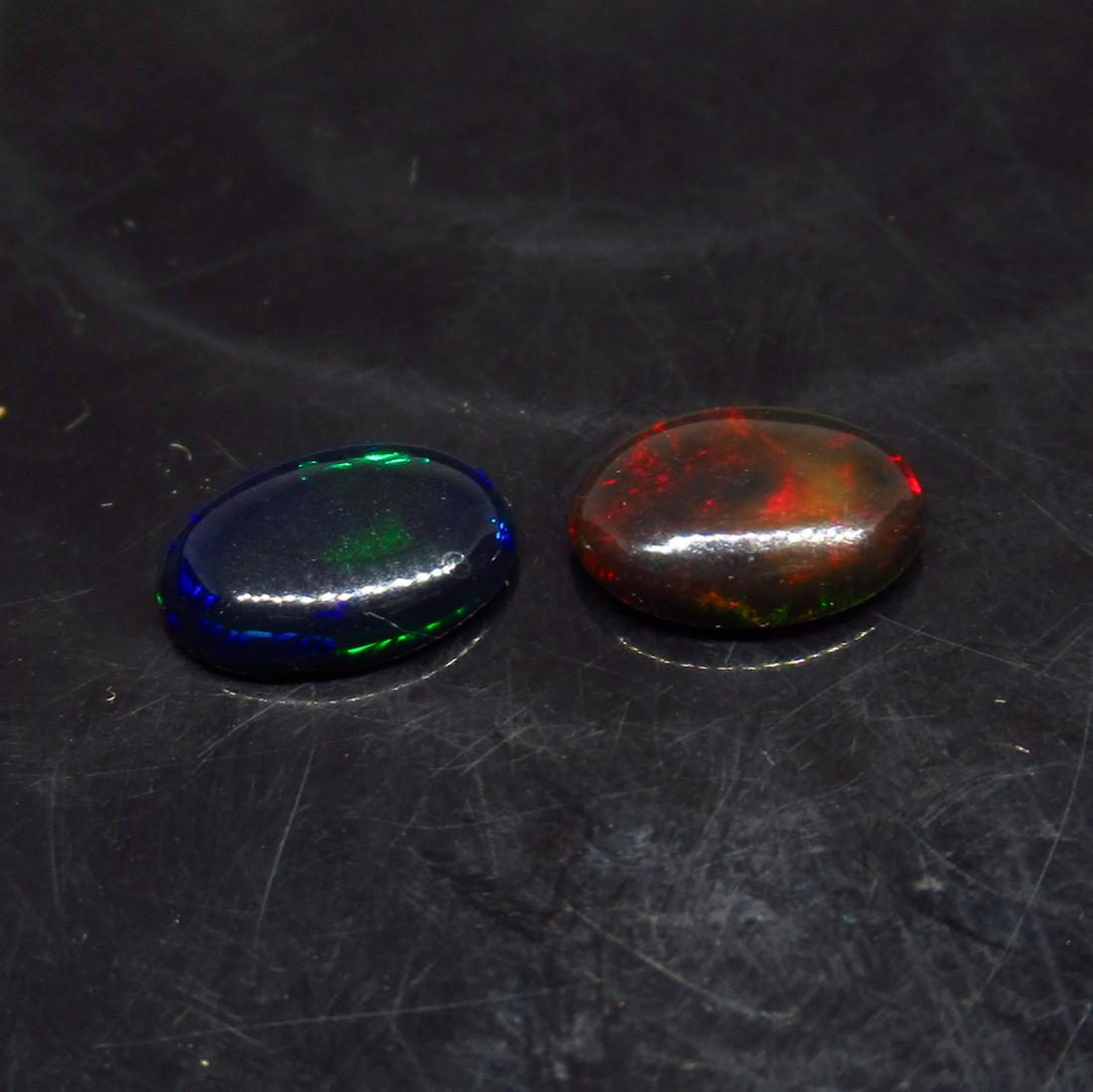 1.13 Ct Natural Ethiopian Black Fire Opal Oval Pair (1 of 2)