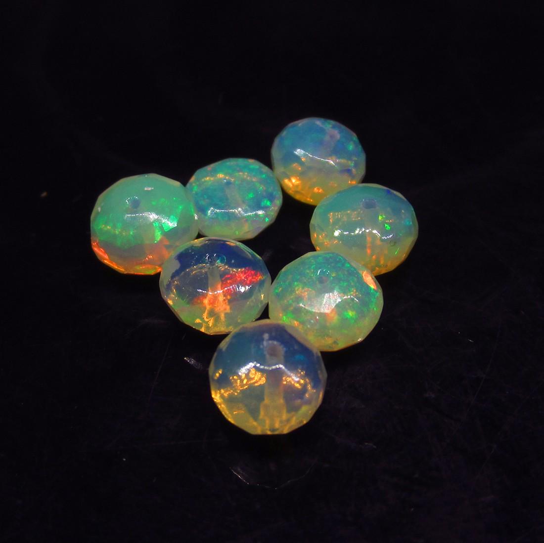 5.40 Ct Natural 7 Ethiopian Drilled Faceted Fire Opal: No Reserve! Title: 5.40 Ct Natural 7 Ethiopian Drilled Faceted Fire Opal Beads Stone Clarity: Transparent Gemstones: Natural Faceted Fire Opal Beads Carat Weights: 5.4 Size/Dimensions: 6.30 to 6.70 mm