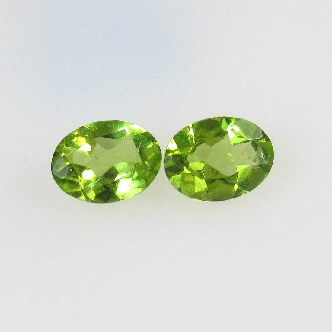 2.44 Ct Natural Pakistan Peridot Oval Pair: No Reserve! Title: 2.44 Ct Natural Pakistan Peridot Oval Pair Stone Clarity: VVS Gemstones: Natural Peridot Carat Weights: 2.44 Size/Dimensions: 8.00 x 6.00 x 3.20 mm / 2 PC's Additional Information: 