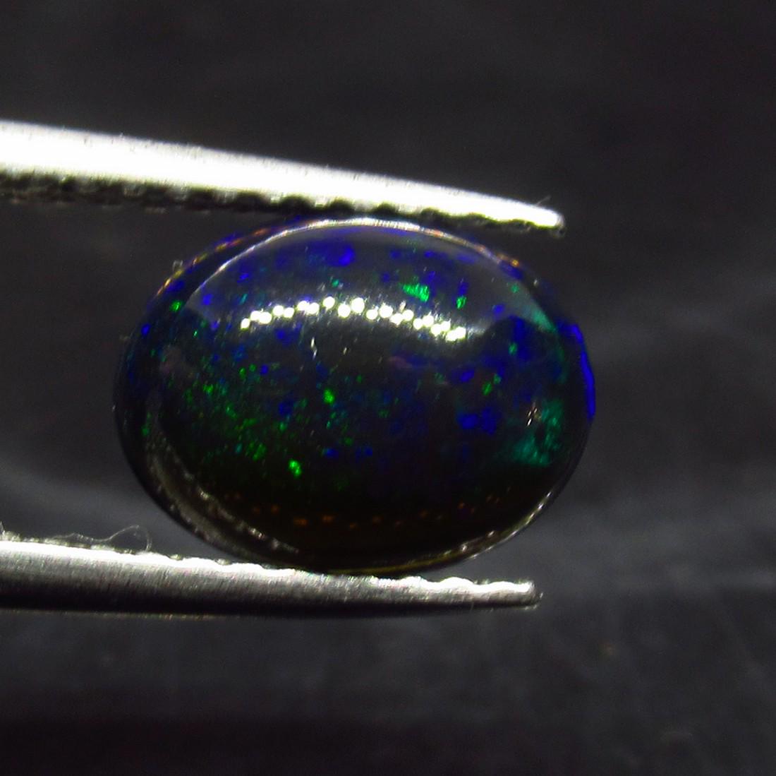 1.78 Ct Natural Ethiopian Black Fire Opal Oval Cab (1 of 2)