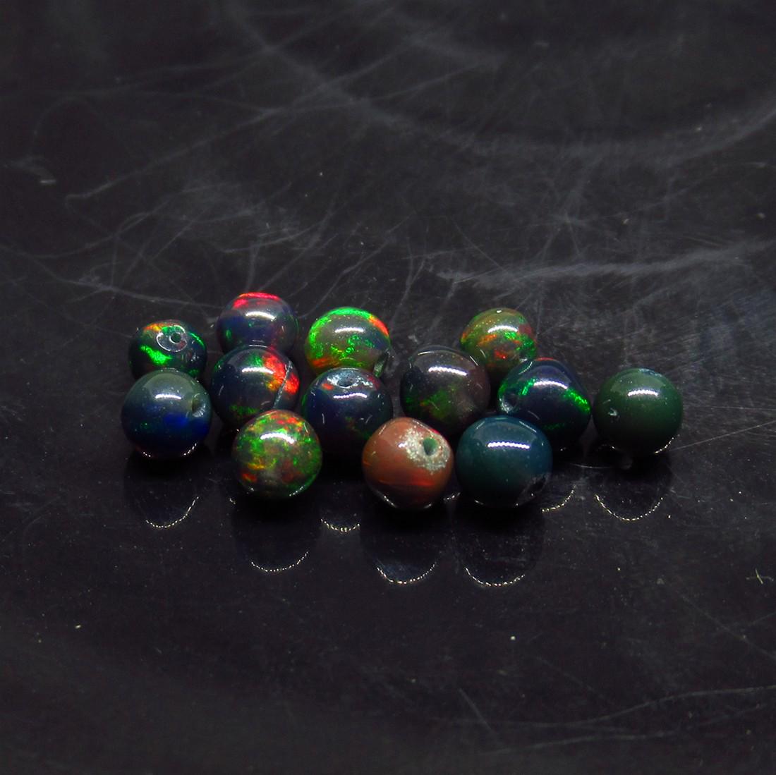 3.80 Ct Natural 12 Drilled Black Fire Opal Ball Beads: No Reserve! Title: 3.80 Ct Natural 12 Drilled Black Fire Opal Ball Beads Stone Clarity: Translucent Gemstones: Natural Black Opal Beads Carat Weights: 3.8 Size/Dimensions: 4.20 to 4.40 mm / 12 PC's Ad