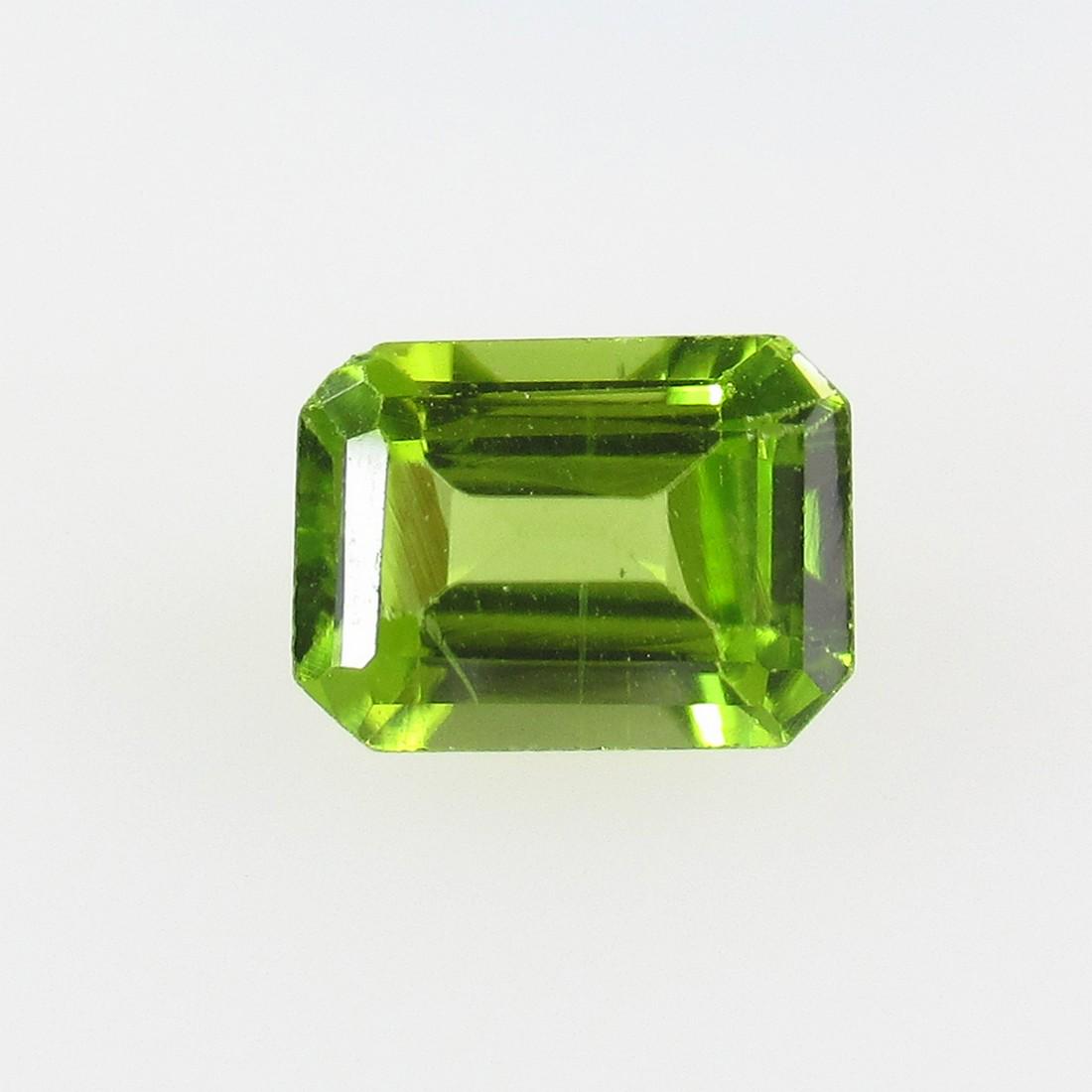 1.74 Ctw Natural Pakistan Peridot Octagon Cut: No Reserve! Title: 1.74 Ctw Natural Pakistan Peridot Octagon Cut Stone Clarity: VVS Gemstones: Peridot Size/Dimensions: 1.74 Carat Weights: 8.30 x 6.00 x 4.00 mm Additional Information: Top Class Lust