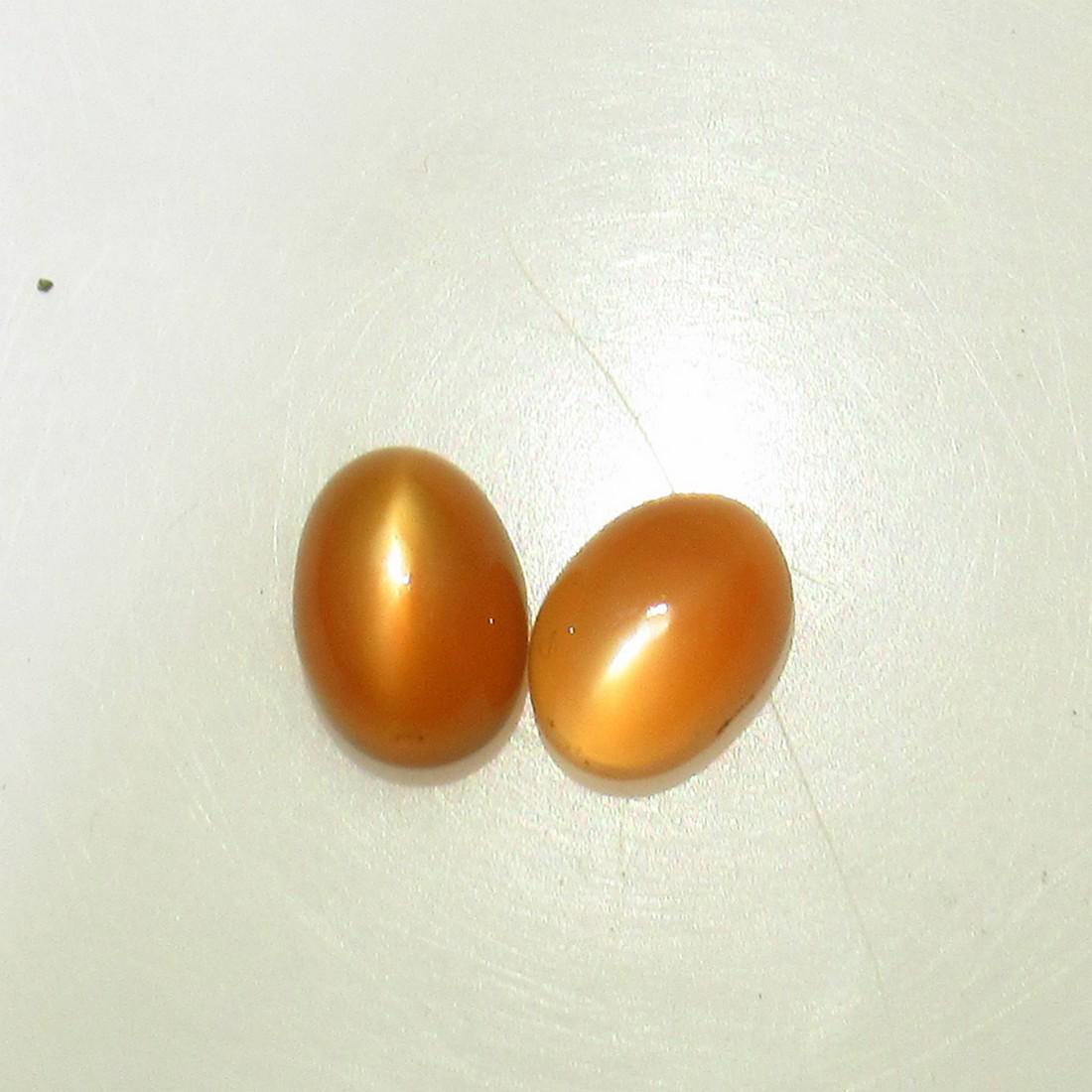 3.32 Ctw Natural Moonstone Oval Pair: No Reserve! Title: 3.32 Ctw Natural Moonstone Oval Pair Stone Clarity: Transparent Gemstones: Moonstone Size/Dimensions: 3.32 Carat Weights: 8.20 x 6.10 x 4.50 mm / 2 Pc's Additional Information: Nice