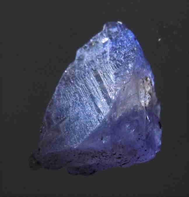 2 CT LIGHT BLUE TANZANITE - UNTREATED GEMSTONE: Title: 2 CT LIGHT BLUE TANZANITE - UNTREATED GEMSTONE Origin: Merelani, Arusha Dist. Tanzania Size: 0.9x0.6x0.45 cm / 0.4 gram Description: light blue, translucent tanzanite Reserve: $3.00 Shipping: D