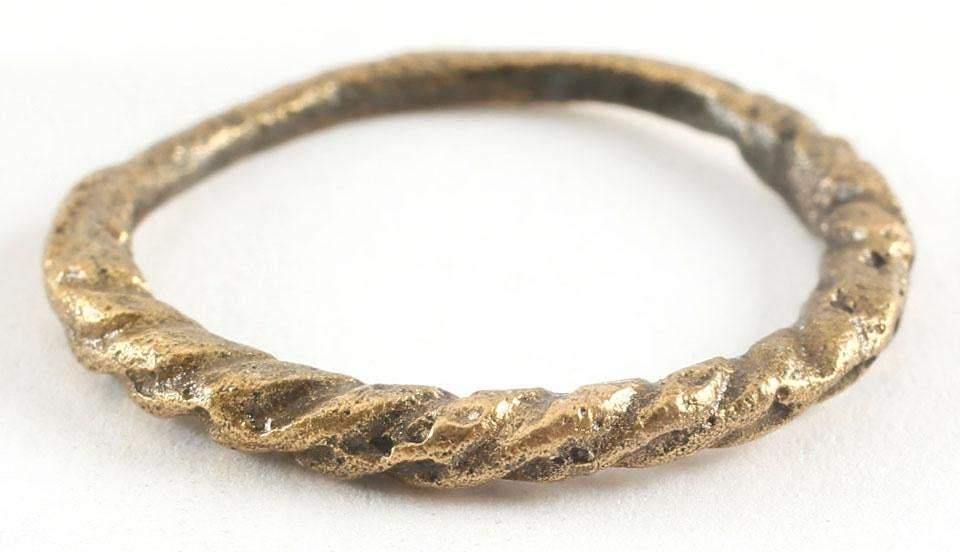 FINE VIKING TWISTED RING C.866-1067 AD JEWELRY SZ 8 ¼: Cambridgeshire England where the Vikings first invaded and conquered the Anglo Saxon natives. Size 8 ¼ with deep twist modeling half its circumference and completely around the cross-section includin