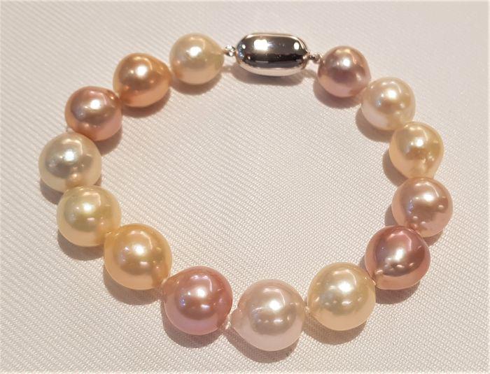 11x13mm Multi Edison Pearls - Bracelet: Title: 11x13mm Multi Edison Pearls - Bracelet Additional Information: Most freshwater pearls are nucleated by tissue, but Edison cultured pearls are nucleated with beads, exactly as saltwater pearlsTh