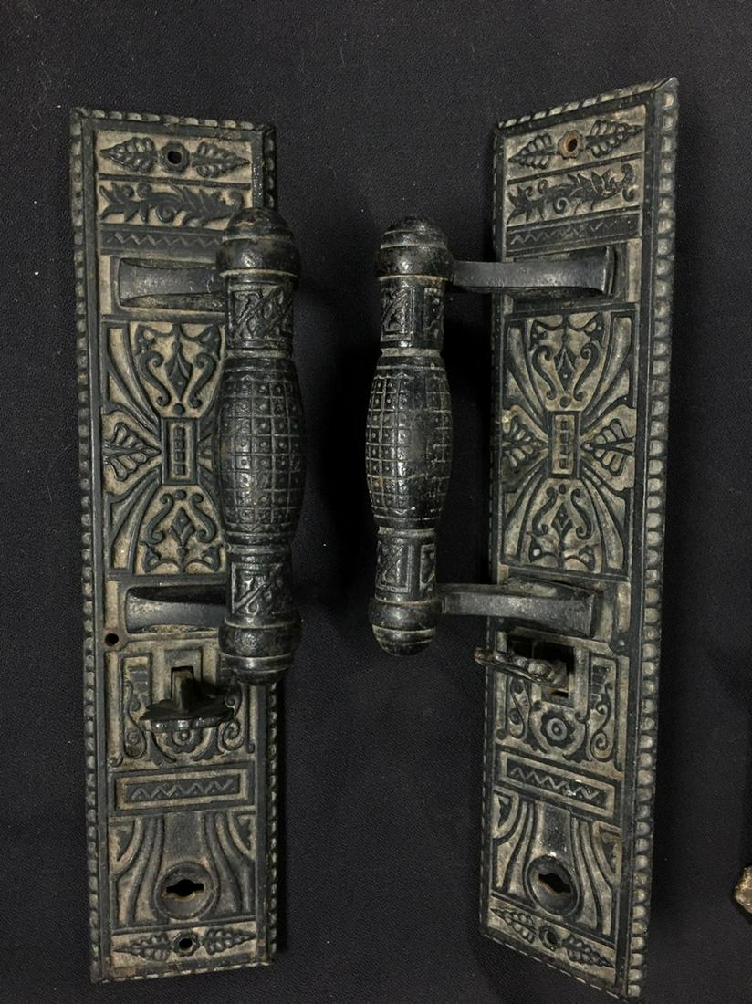 2 beautiful Fancy Cast Iron Victorian Door Pull handles: Title: 2 beautiful Fancy Cast Iron Victorian Door Pull handles with thumb locks and pulls Date/Period: 1870-1900 Materials: Cast iron Dimensions: W. 2.75 x H. 12.25 Inches Description: This lot includ