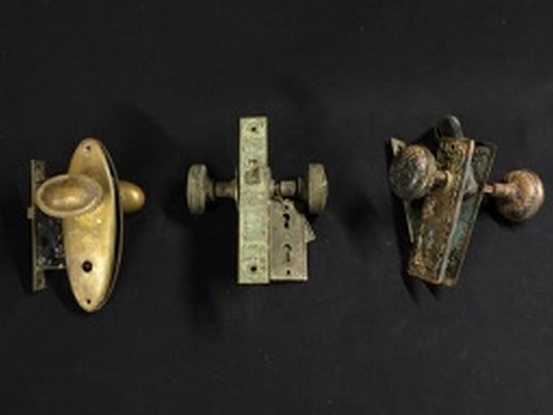 3 Victorian doorknobs fancy back plates & iron locks: Title: 3 Victorian doorknobs fancy back plates & iron locks Date/Period: 1880-1900 Materials: bronze knobs, plated iron and brass back plates paired with an iron lock sets Dimensions: lock set #1: W.5