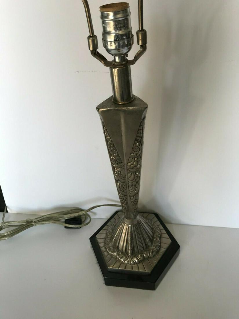 Art Deco Lamp,Silvered Bronze,Black marble base: A typical Art Deco Lamp. Has a Antique Silver patina finish . Mounted on an Absolute Black marble base . Ht up yo socket is 16" and has a 9" harp . 25" ht . Base is 6" across . No shade Real Deco look