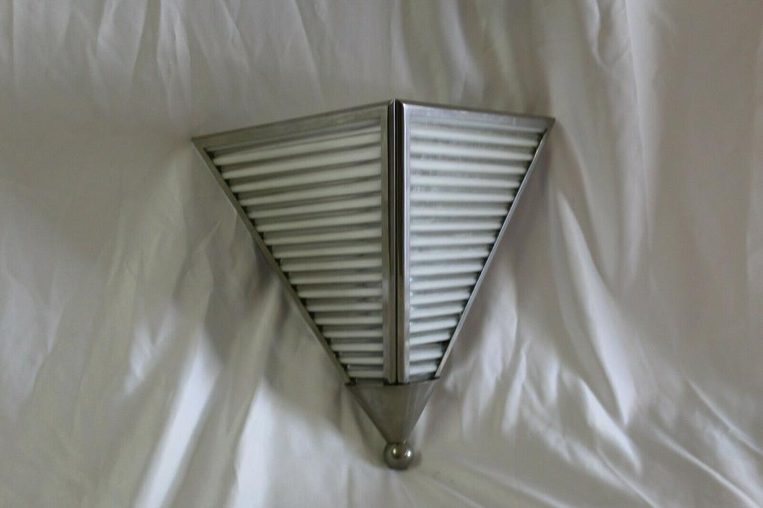 Art Deco Style Sconce , Glass rods ,Hi-polished Nickel: Real Deco style of a Glass rod Sconce with real Glass Rods in Clear and white alternating . Uses a single candelabra socket . Made around the 1960,s and has the UL sticker . Was used as a sample for d