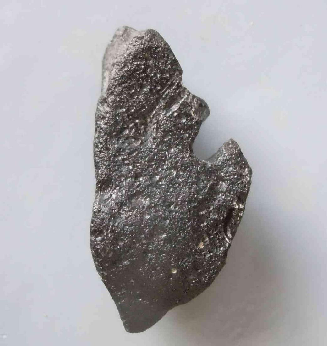 PHILIPPINITE TEKTITE - FROM METEORITE IMPACT: Title: PHILIPPINITE TEKTITE - FROM METEORITE IMPACT Origin: Paracale, Camarines Norte, Luzon, Philippines Size: 3x2x1 cm / 7 gram Description: sharp crested & sculptured rizalite/phlippinite tektite R