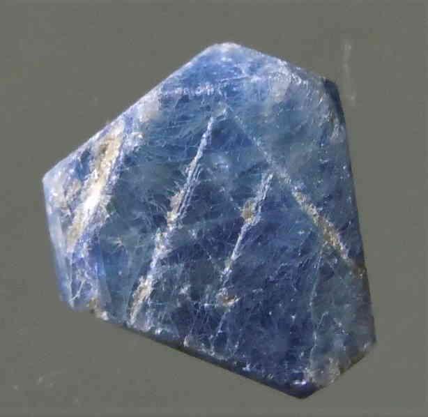 3 CT TRANSLUCENT SAPPHIRE - UNTREATED GEMSTONE: Title: 3 CT TRANSLUCENT SAPPHIRE - UNTREATED GEMSTONE Origin: Zazafotsy Quarry, Ihosy Dist. Ihorombe, Madagascar Size: 0.8x0.8x0.3 cm / 0.65 gram Description: translucent, flattened sapphire crystal w