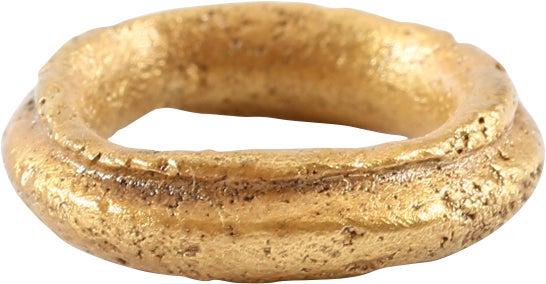 RARE VIKING WARRIOR’S BEARD RING, 9TH-11TH CENTURY: 9th-11th century AD. Gilt bronze, formed as a large circular section conjoined with a small circular ring, 0.60”, over 1/2” diameter and 0.40” inside. 3.5mm thick The use of beard rings by Vikin