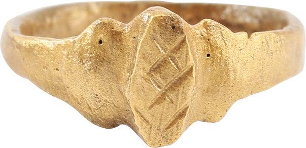 MEDIEVAL WOMAN’S FASHION RING C.1200-1400 AD SIZE 4: C.1200-1400 AD. Good wearable size 4 for the small finger. Rounded band 2.3mm width expanded below the shoulders. Raised oval bezel with hatched motif cut in. This ring, by its quality, would have dis