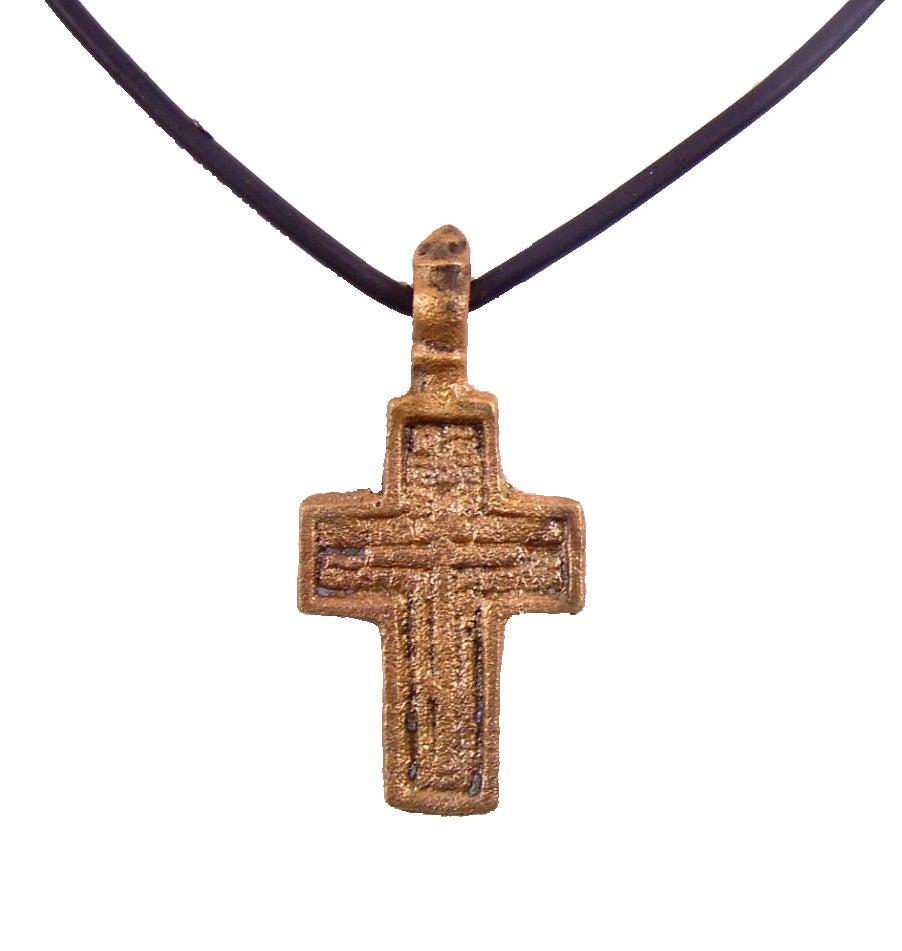 EASTERN EUROPEAN CHRISTIAN CROSS NECKLACE 17TH-18TH C.: 17th-18th century, Polish, Russian or Ukrainian. Orthodox rite. Silvered bronze, over 1 1/8” height plus the suspension loop. Relief decoration with raised borders and central cross surrounded by Cy