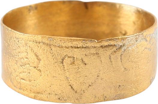 VIKING WARRIOR’S BEARD RING, 9th-11th CENTURY AD: Gilt bronze with a flat face. 5.2 to 7.6mm width, expanding to the front with incised heart, flanked by curvilinear figures and hatched panels. 0.67 inner diameter (about 5/8”). The heart stood for 