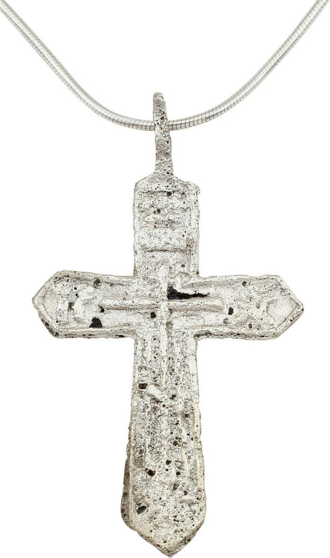 EUROPEAN CHRISTIAN CROSS NECKLACE, 18th-19th CENTURY: Southern Russian, or Ukrainian. Good example, 1 1/2” height plus the suspension loop. Silvered bronze with a cross on the front with Cyrillic ciphers at the beam terminals. The reverse with Cyrillic