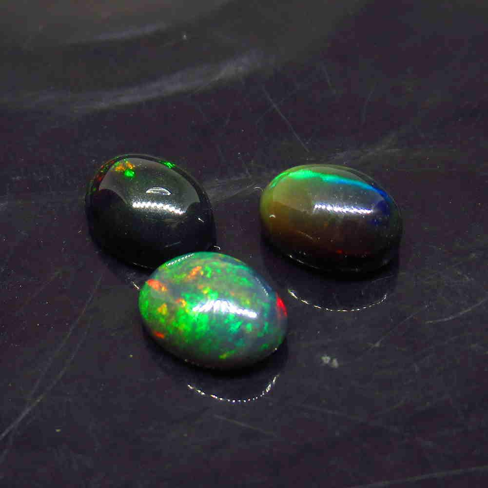 2.89 Ctw Natural 3 Ethiopian Black Fire Opal Oval Set (1 of 2)