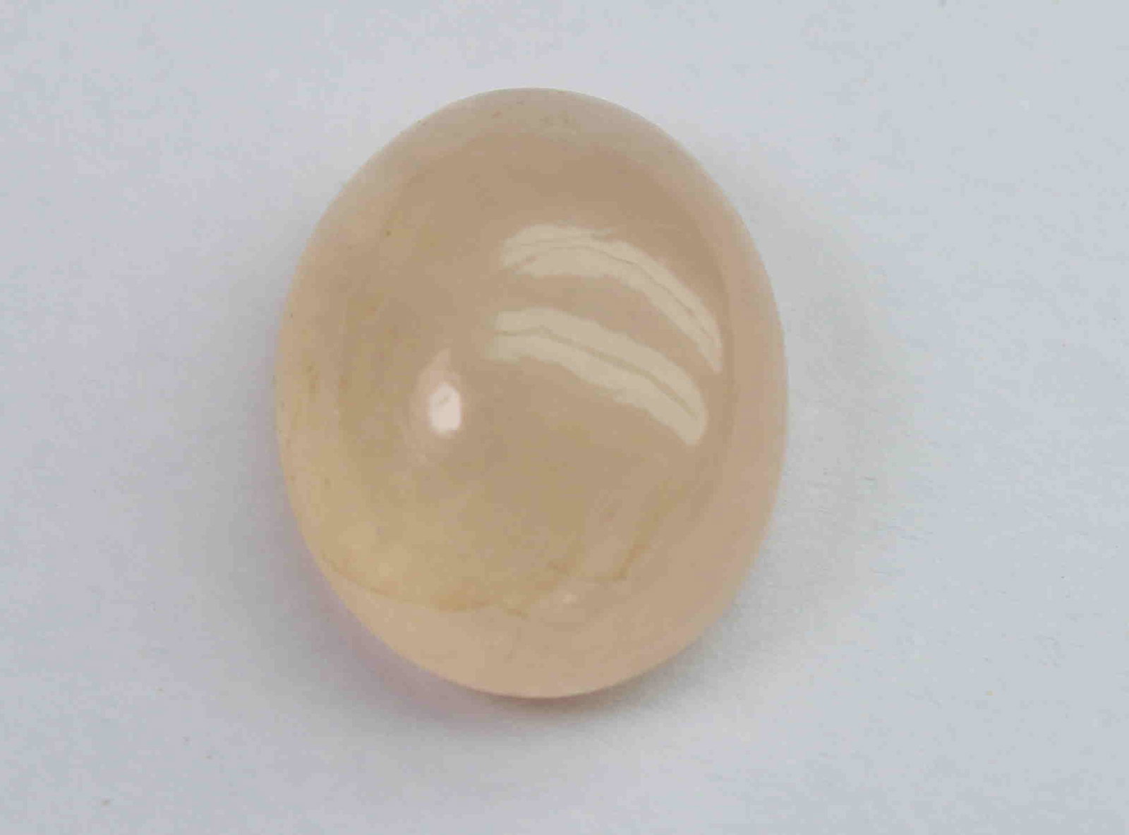 7.68 Ct Natural Morganite: No Reserve! Title: 7.68 Ct Natural Morganite Additional Information: Gemstone: Natural MorganiteOrigin: Africa Weight: 7.68 Carats Measurements: 13.7x11.1xx6.7 mm Shape : Oval Cabochon Colour: Peach T