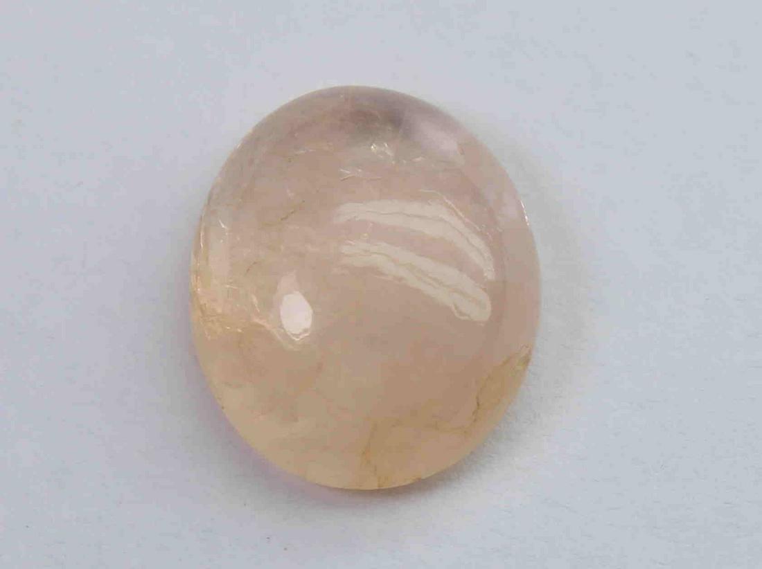 4.95 Ct Natural Morganite: No Reserve! Title: 4.95 Ct Natural Morganite Additional Information: Gemstone: Natural MorganiteOrigin: Africa Weight: 4.95 Carats Measurements: 12..7x10.6x5.1 mm Shape : Oval Cabochon Colour: Peach T