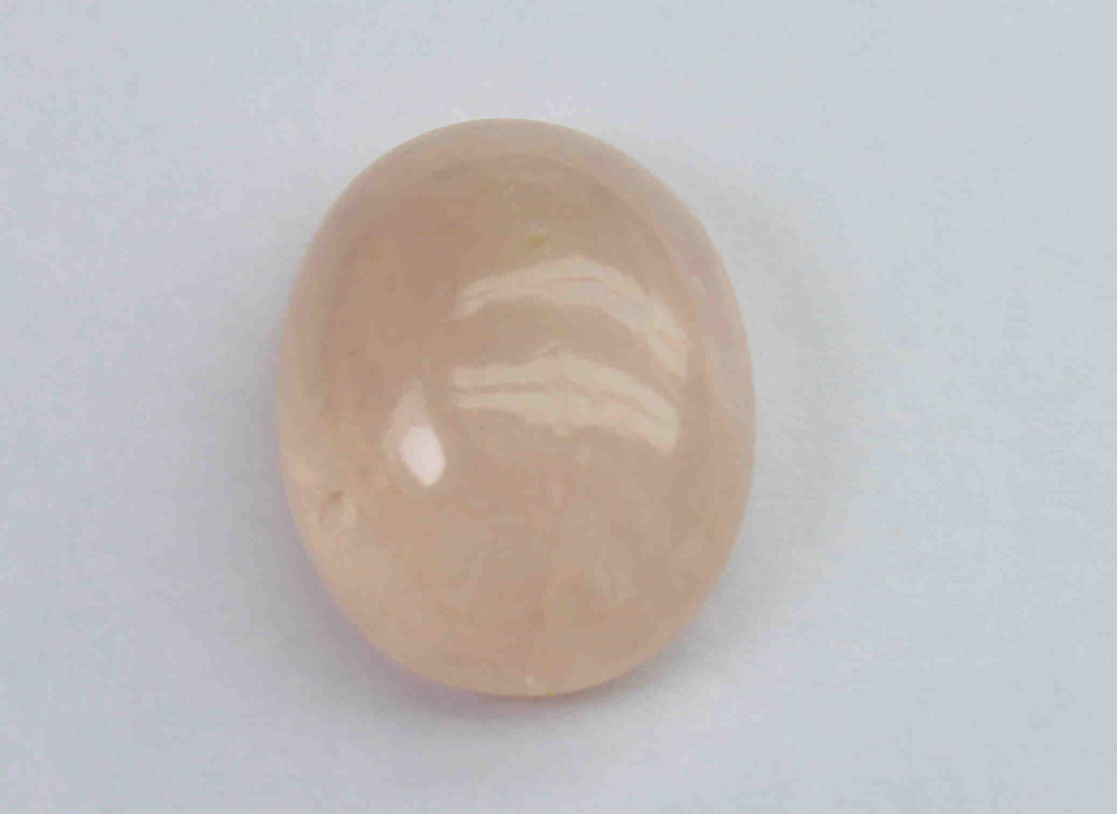 7.59 Ct Natural Morganite: No Reserve! Title: 7.59 Ct Natural Morganite Additional Information: Gemstone: Natural MorganiteOrigin: Africa Weight: 7.59 Carats Measurements: 13.9x11.2x6.4 mm Shape : Oval Cabochon Colour: Peach Tr