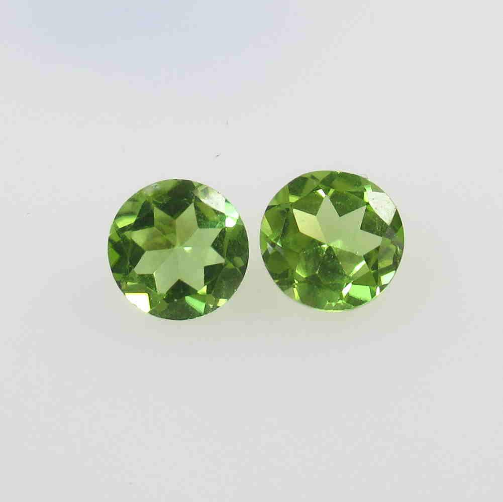 2.47 Natural Pakistan Peridot Round Pair: No Reserve! Title: 2.47 Natural Pakistan Peridot Round Pair Stone Clarity: VVS Gemstones: Natural Peridot Carat Weights: 2.47 Size/Dimensions: 7.00 x 7.00 x 4.00 mm / 2 PC's Additional Information: To