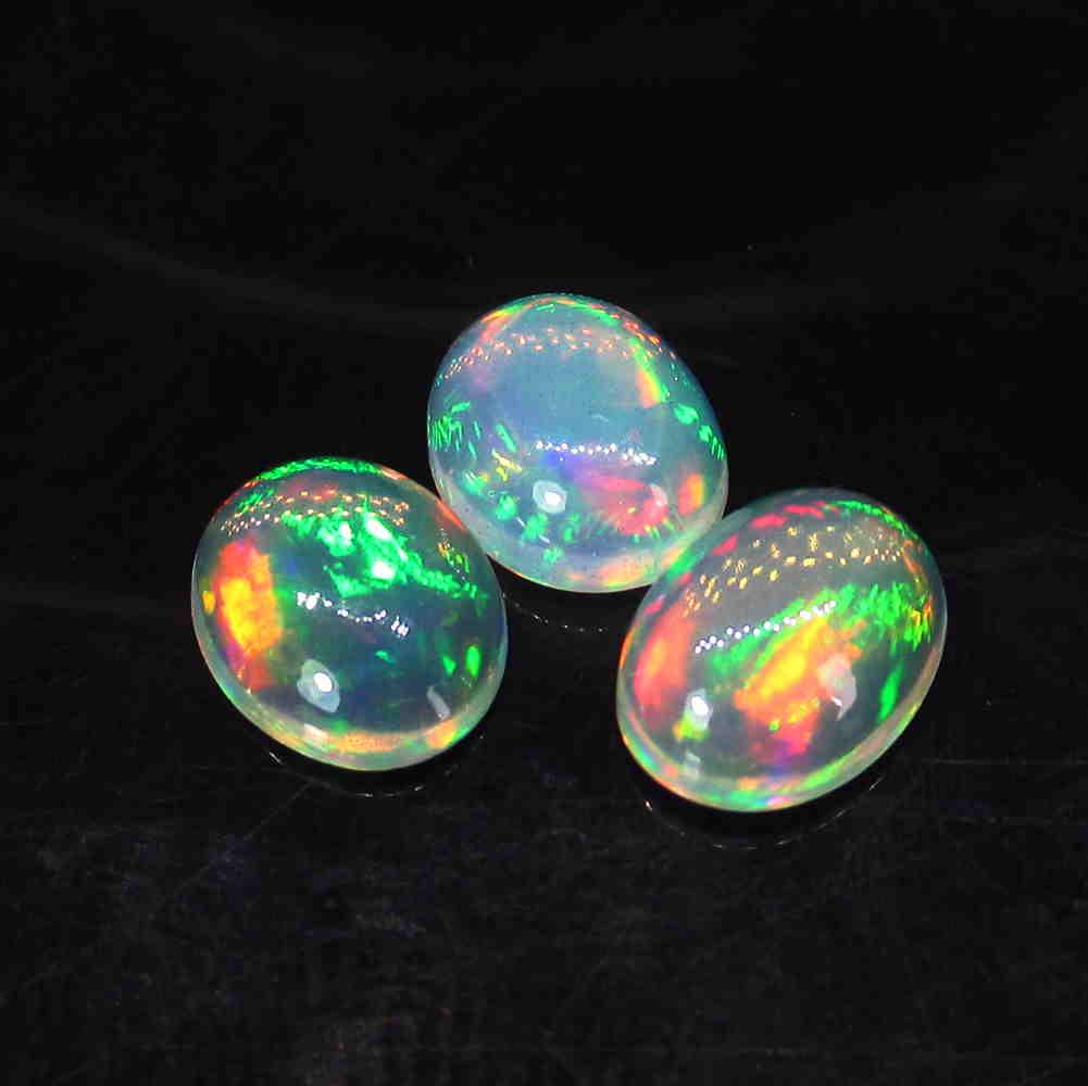 1.69 Ct Natural 3 Ethiopian Multicolor Fire Opal Oval (1 of 2)