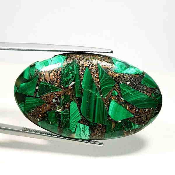 50.59 ct Natural Copper Malachite: No Reserve! Title: 50.59 ct Natural Copper Malachite Color/Clarity: Opaque Gemstones: Loosegemstone Carat Weights: 50.59 Size: 38.18 x 22.38 x 5.71 Additional Information: Oval - USA/Egypt Shipping:
