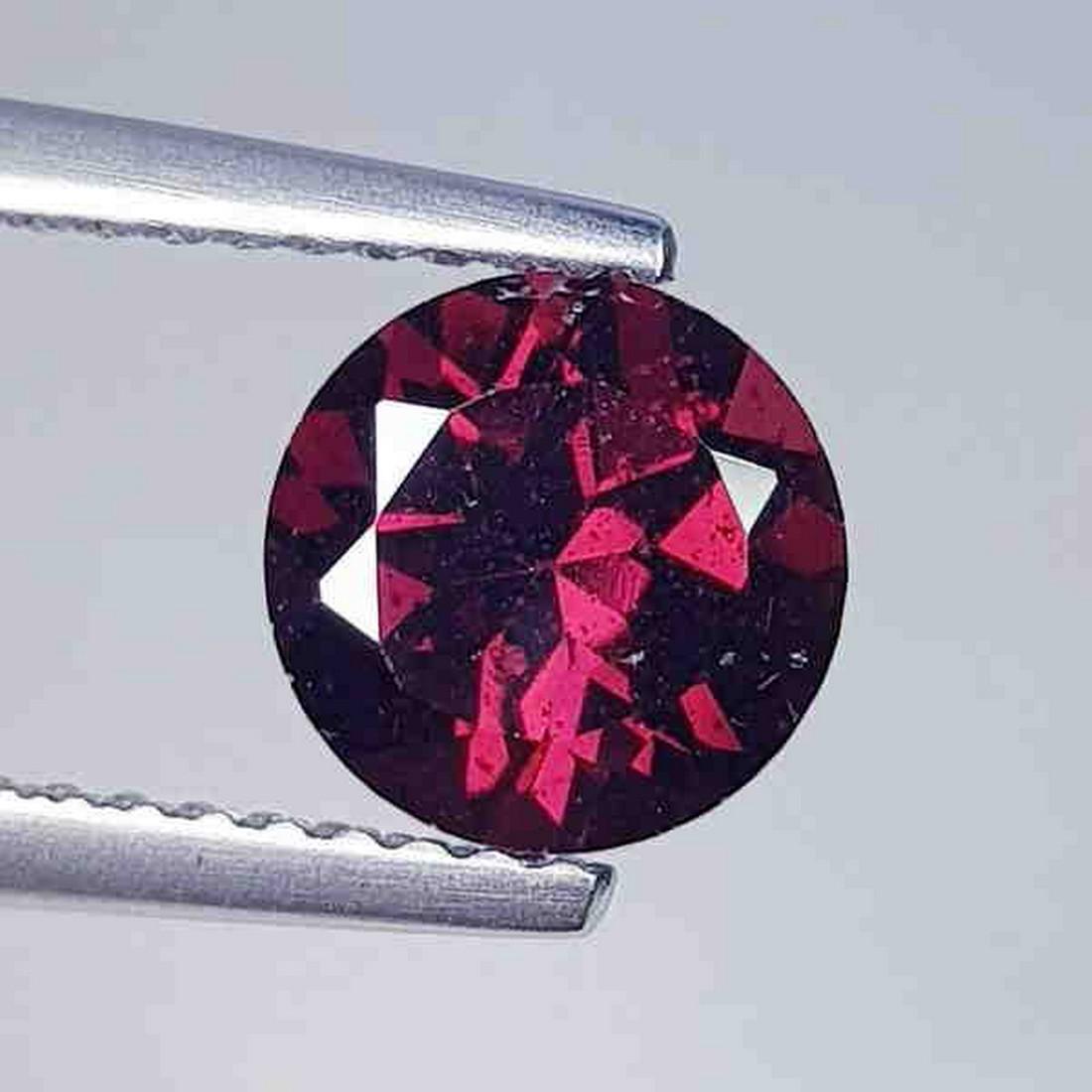 Natural Rhodolite Garnet Round Cut 1.71 ct: No Reserve! Title: Natural Rhodolite Garnet Round Cut 1.71 ct Color/Clarity: VVS - VS Gemstones: Gemstones Carat Weights: 1.71 Size: 7.09 x 7.09 x 4.61 Additional Information: Round - Burma Shipping: