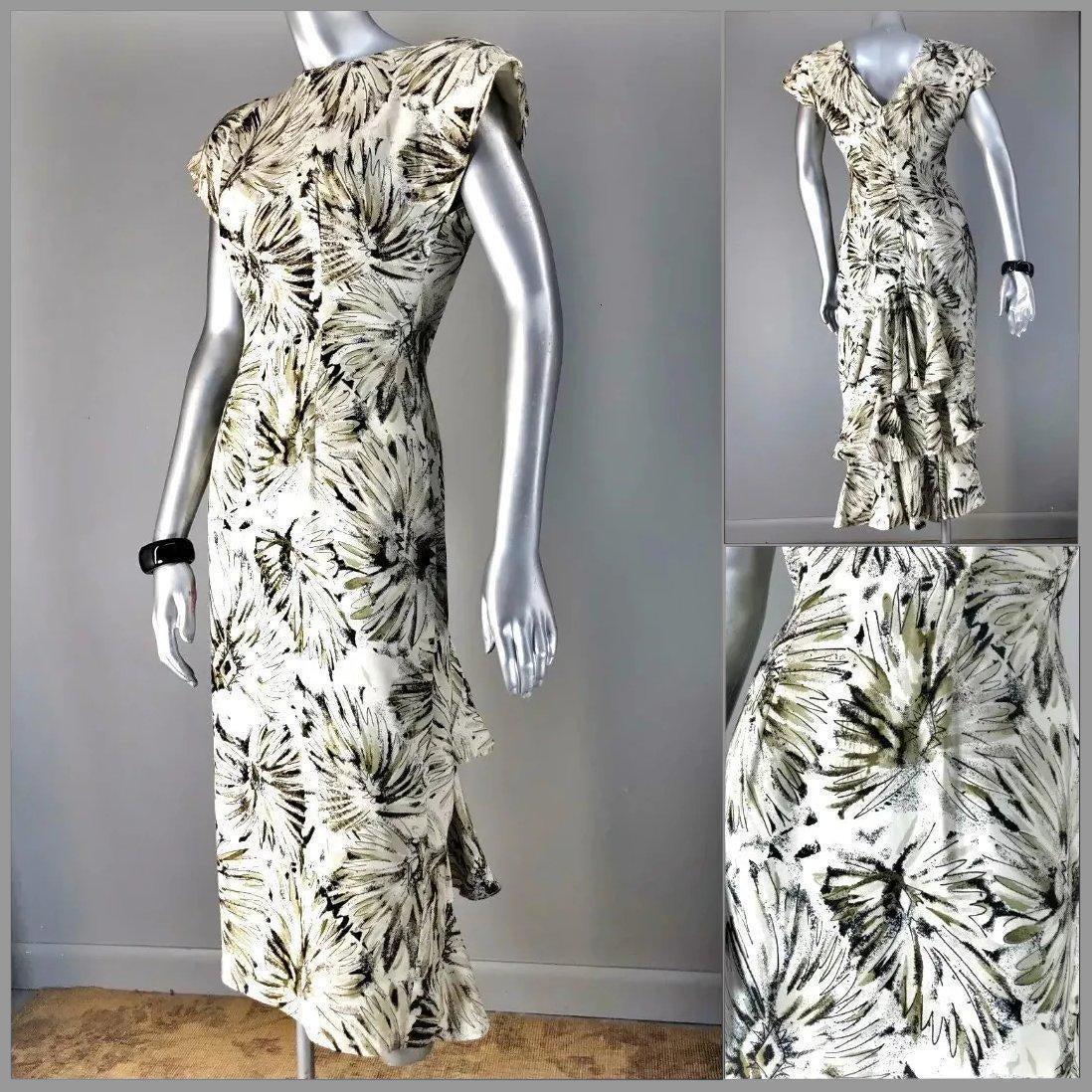 Vtg Young Edwardian 1980's does Atomic 40's-50's Peplum: Amazing Peplum Young Edwardian dress in an amazing Design and fabric. In very good vintage condition. ready to add dimension to your Wardrobe. Bust-33" Waist-26" Hip-35" Reserve: $55.00 Shipping: Dome
