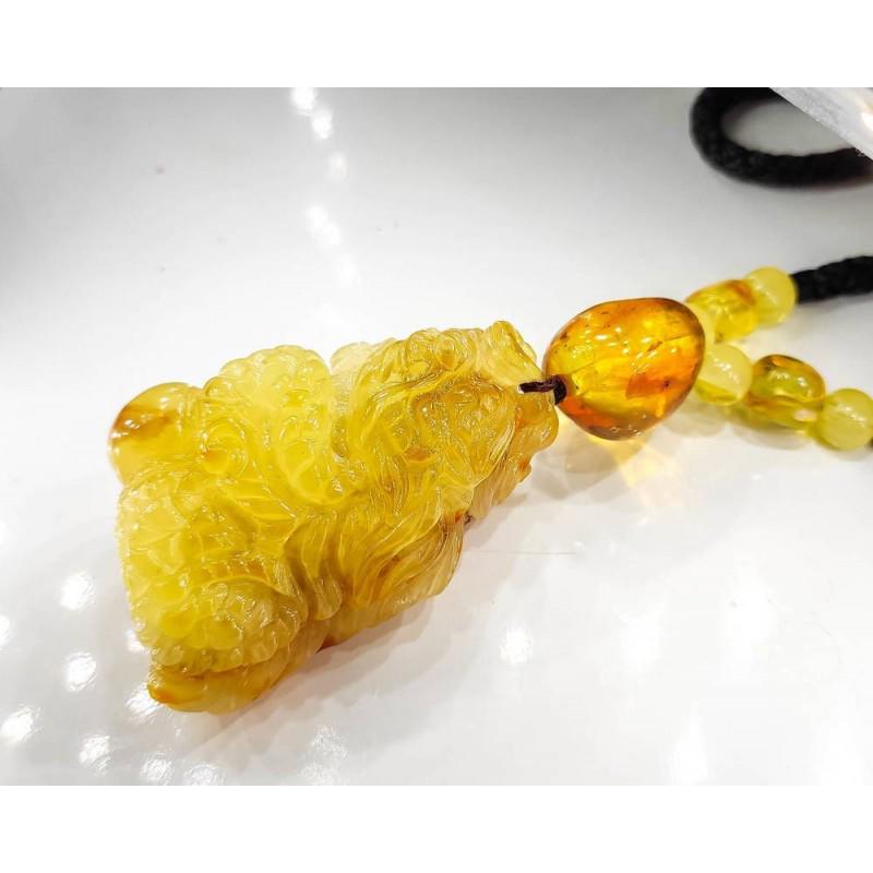 37 gram pendant "Dragon" from natural amber on a cord (1 of 10)