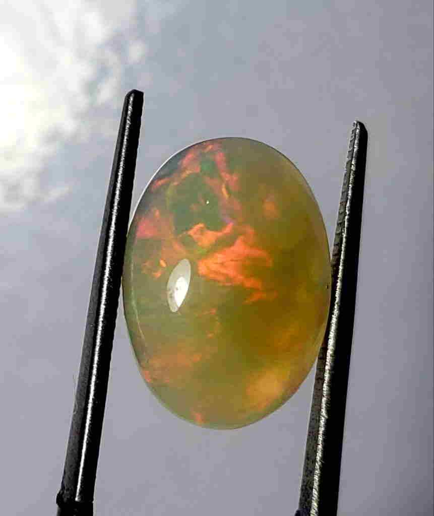 Fire Ethopian Opal Oval Shape - 4 Carats - 14X11X6 mm (1 of 4)