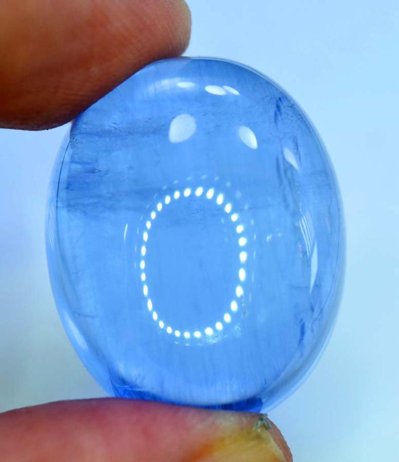 38.85 cts Natural Blue Aquamarine Cabochon - 23*19*11: Material Gem type: Aquamarine Dimensions Carat weight: 38.85 Description 38.85 cts Natural Blue Aquamarine Cabochon - Weight : 38.85 cts Dimensions : 25*17*15 mm Locality : Pakistan Color : Blue Treat