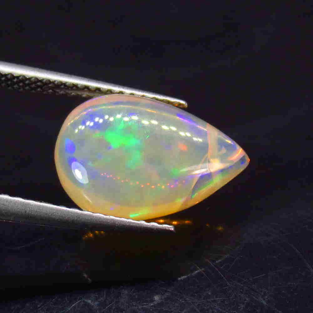 3.52 Ct Natural Ethiopian Multicolor Fire Opal Pear Cab (1 of 2)