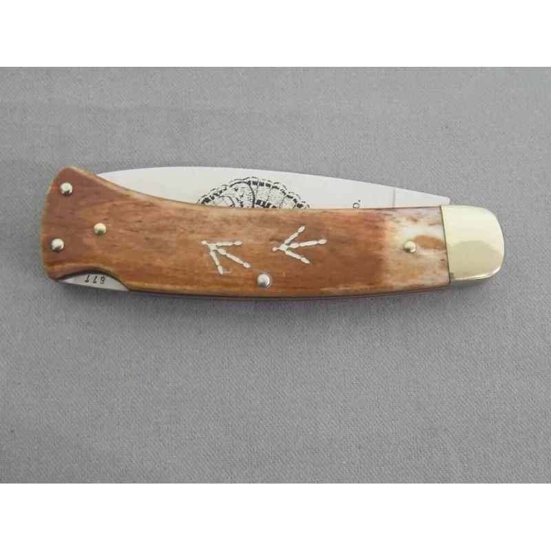 Old stainless steel Germany knife bone: Germany knife 1984 Single blade lockback Old Tom limited edition Smooth bone handles Made in Germany in 1984 Turkey etched blade Turkey tracks inlaid handle Knife is UNUSED in original box and papers 