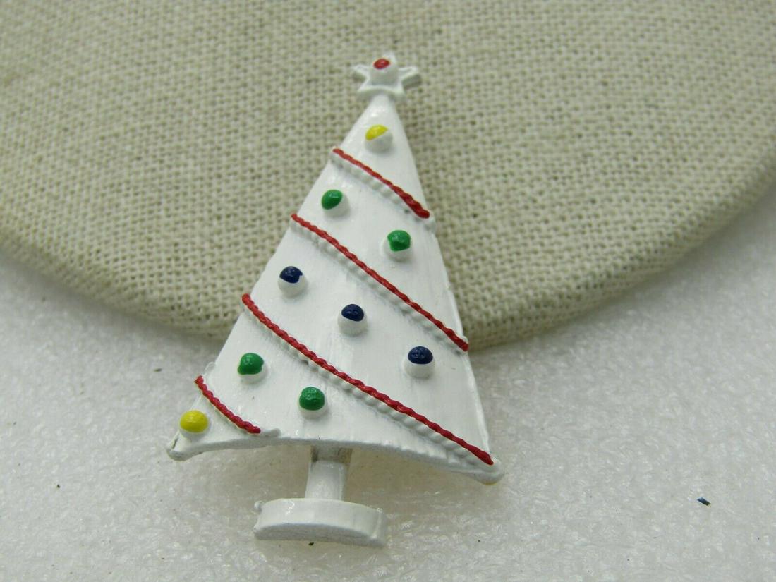 Vintage Enameled Christmas Tree Brooch, Clear Box,: Vintage Enameled Christmas Tree Brooch, Clear Box, White, Red, Green, Blue, 2" by 1.25". 1960's Enameled in white with red and green and blue highlights. Gold tone back. Not signed by maker. Comes in