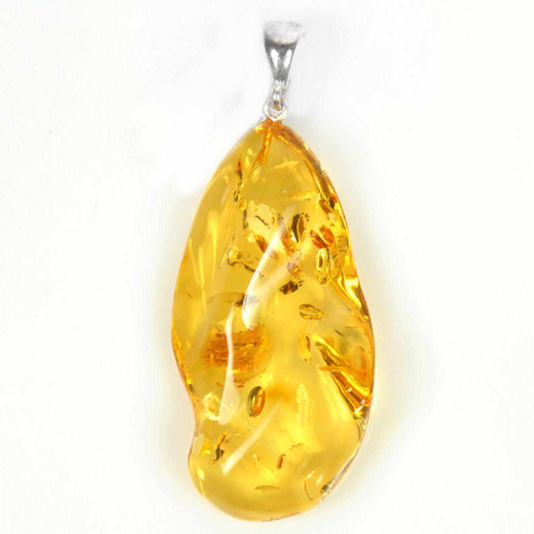Natural Baltic Amber Pendant: Title: Natural Baltic Amber Pendant Materials: Natural Baltic Amber Weight in grams: 5.34 Additional Information: Natural Baltic Amber Pendant. Sterling Silver 925. Free shape finish. Lemon color. Res
